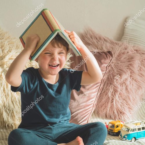 depositphotos_340111792-stock-photo-a-little-boy-sits-on
